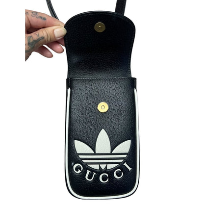 GUCCI Grained Leather Adidas x Gucci Phone Holder Black and White Gold Hardware Gu635