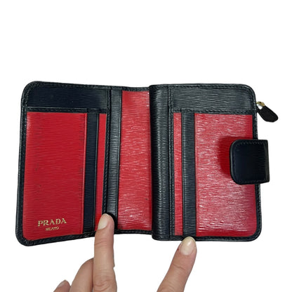 PRADA Vitello Move 1ML018 Bifold Wallet Black Gold Hardware PR215